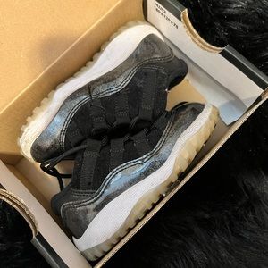 Black toddler boy Jordan retros.